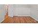 Bedroom with laminate flooring, closet, and neutral walls at 197 Horseshoe Loop, Statesville, NC 28625