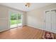 Bright dining area with sliding glass doors leading to the backyard patio at 197 Horseshoe Loop, Statesville, NC 28625