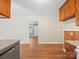 Cozy kitchen featuring wood cabinets, sleek appliances, and an open doorway at 197 Horseshoe Loop, Statesville, NC 28625