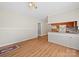 Open living space featuring wood floors, neutral paint and kitchen view at 197 Horseshoe Loop, Statesville, NC 28625