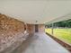 Covered brick patio area, perfect for entertaining or relaxing at 197 Horseshoe Loop, Statesville, NC 28625