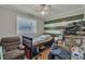 Comfortable bedroom featuring a single bed, wood floors, and natural lighting at 2008 Kimway Dr, Matthews, NC 28105