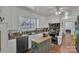 Well-lit kitchen featuring stainless steel dishwasher, island prep space and window at 2008 Kimway Dr, Matthews, NC 28105