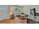 Well-lit living room with hardwood floors at 2008 Kimway Dr, Matthews, NC 28105
