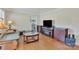 Living room with hardwood floors and neutral walls at 2008 Kimway Dr, Matthews, NC 28105