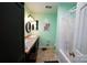 Bright bathroom features a granite countertop, a tub shower, and stylish light fixtures at 2087 Poinsett Dr, Rock Hill, SC 29732