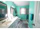 Stylish bathroom featuring a dual vanity, tiled floor, and a glass enclosed shower at 2087 Poinsett Dr, Rock Hill, SC 29732