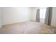 This bedroom boasts neutral carpeting, ample sunlight, and generous space at 2087 Poinsett Dr, Rock Hill, SC 29732