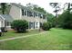 Charming home boasts a well-manicured front lawn and traditional architectural design at 2087 Poinsett Dr, Rock Hill, SC 29732