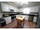 Bright kitchen featuring stainless steel appliances, granite countertops, and center island at 2087 Poinsett Dr, Rock Hill, SC 29732