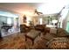 Cozy living room featuring hardwood floors, a fireplace, and ample seating for gatherings at 2087 Poinsett Dr, Rock Hill, SC 29732