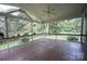 Spacious screened-in porch with tile flooring, offering a relaxing outdoor living area at 2087 Poinsett Dr, Rock Hill, SC 29732