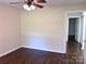Comfortable bedroom with ceiling fan and access to closet at 218 Hartman St, Gastonia, NC 28052