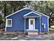 Blue house exterior with white trim and a covered front porch at 218 Hartman St, Gastonia, NC 28052