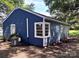 Side view of the home exterior with bay window and AC unit at 218 Hartman St, Gastonia, NC 28052