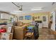 Large basement area with comfortable seating, TV, storage, and potential for customization at 2256 Drawbridge Ct, Rock Hill, SC 29732
