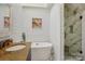 Elegant bathroom with a freestanding tub, granite vanity, and a modern glass-enclosed shower at 2256 Drawbridge Ct, Rock Hill, SC 29732