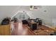 Spacious bonus room with ceiling fans, desk and lounge area at 2256 Drawbridge Ct, Rock Hill, SC 29732