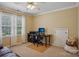 Functional home office space featuring a desk, a comfortable chair, and natural light from the window at 2256 Drawbridge Ct, Rock Hill, SC 29732