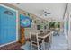 Covered patio featuring blue concrete, outdoor seating and tropical decorations at 2256 Drawbridge Ct, Rock Hill, SC 29732