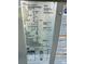 HVAC unit label with model and serial number information at 22987 Alonzo Rd, Oakboro, NC 28129