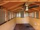 Partially finished shed interior with plywood and exposed beams at 22987 Alonzo Rd, Oakboro, NC 28129