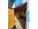 Partially finished shed interior with plywood and ceiling fan at 22987 Alonzo Rd, Oakboro, NC 28129