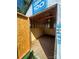 Partially finished shed interior with plywood and ceiling fan at 22987 Alonzo Rd, Oakboro, NC 28129