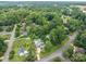 Beautiful aerial view of a home nestled among lush green trees at 2410 Monticello Dr, Gastonia, NC 28056
