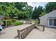 Private backyard offers an expansive deck with serene pool views at 2410 Monticello Dr, Gastonia, NC 28056
