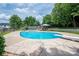 Enjoy this backyard pool with diving board for summertime fun at 2410 Monticello Dr, Gastonia, NC 28056