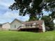 Spacious backyard with a wooden deck, ideal for outdoor entertaining and relaxation at 2511 Old Pond Dr, Lincolnton, NC 28092