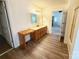 Bathroom with wood cabinets, vanity, and modern flooring at 2511 Old Pond Dr, Lincolnton, NC 28092