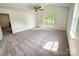 Spacious bedroom featuring high ceilings and large windows at 2511 Old Pond Dr, Lincolnton, NC 28092