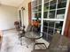 Cozy front porch setup with outdoor furniture, perfect for relaxing and enjoying the outdoors at 2511 Old Pond Dr, Lincolnton, NC 28092