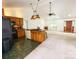 Kitchen island with sink and seating, complemented by modern appliances and ample cabinet space at 2511 Old Pond Dr, Lincolnton, NC 28092