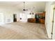Spacious living room with high ceilings and an open layout to the kitchen and other areas of the home at 2511 Old Pond Dr, Lincolnton, NC 28092