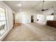 The living room features abundant natural light and an open layout, enhancing its welcoming atmosphere at 2511 Old Pond Dr, Lincolnton, NC 28092