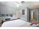Comfortable bedroom featuring a built-in desk and ample storage space at 307 Dogwood Dr, Mount Holly, NC 28120