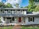 Beautiful two-story home with red front door, and a brick walkway to the front porch at 310 25Th Nw Ave, Hickory, NC 28601