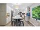 Kitchen boasts a large island with seating, stainless appliances, and white cabinetry at 310 25Th Nw Ave, Hickory, NC 28601