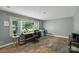 Office with wood floors, fan, and desk overlooking the backyard through a window at 310 25Th Nw Ave, Hickory, NC 28601