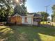 Exterior home view featuring yard and showing framed portion at 310 E Division Ave, East Spencer, NC 28039