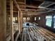 Interior shot showing the frame work and the shell of the home, ready for renovation at 310 E Division Ave, East Spencer, NC 28039