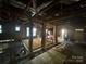 Exposed interior showing the frame work and structure, revealing construction at 310 E Division Ave, East Spencer, NC 28039