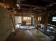 Interior shot showing the frame work and the shell of the home, ready for renovation at 310 E Division Ave, East Spencer, NC 28039