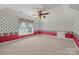 Bedroom with floral wallpaper and window for plenty of natural light at 322 Oakview Dr, Salisbury, NC 28146