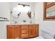 Bathroom with dual sinks and vanity with lots of cabinet space below at 3311 Camden Rd, Marshville, NC 28103