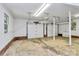 Spacious garage with multiple doors, ample lighting and a concrete floor at 3311 Camden Rd, Marshville, NC 28103
