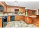 Spacious kitchen featuring light-colored cabinetry, tile flooring, and breakfast bar at 3311 Camden Rd, Marshville, NC 28103